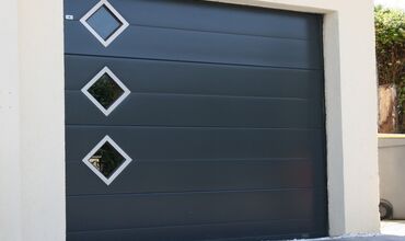 Portes de garage &agrave;&nbsp;COMMENTRY